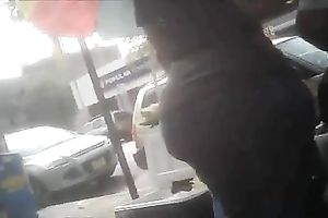 Following big asses on the streets with camera
