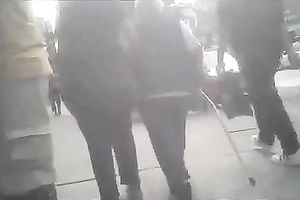 Following big asses on the streets with camera