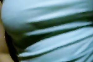 My bosomy and zealous girlfriend pleases herself with a marital-device of her cellphone