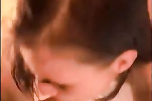 Brunette cutie licks my shlong and lets me cum on her face