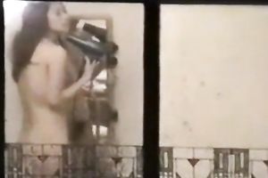 A spy clip showing a horny white wife drying her hair totally nude