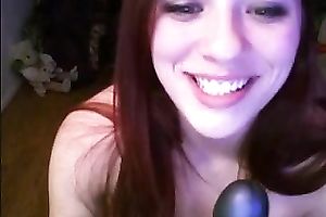 Beautiful white redhead legal age teenager deepthroats a dark vibrator