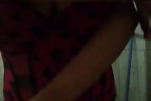 Webcam solo clip with a corpulent Latina flashing her natural tits