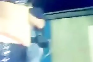 Amateur brunette hair hussy dances in front of a crowd in homemade video