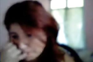 Red-haired virtual hooker shows off her large boobs and booty