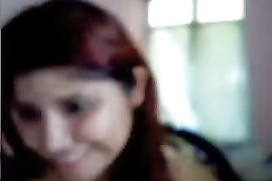 Red-haired virtual hooker shows off her large boobs and booty