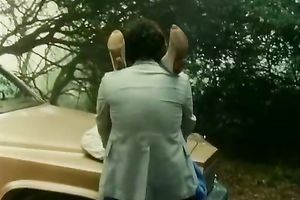 Horny retro golden-haired bitch receives her slit fucked hard on a car