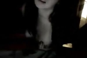 This exposed legal age teenager enjoys playing with herself in front of a webcam