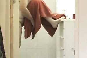 My short-haired older horny white wife wipes her unshaved pussy after shower