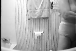 My pleasing short-haired amateur wife takes a shower on hidden livecam