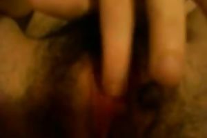 Close up homemade clip with my husband fingering her bushy slit