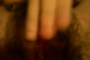 Close up homemade clip with my husband fingering her bushy slit
