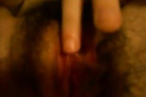 Close up homemade clip with my husband fingering her bushy slit
