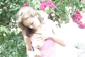 My neat princess is playing with her pink pussy by the pool