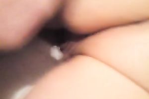 Curvaceous white girl lay on her stomach naked in my ottoman