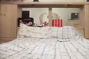 Cute pigtailed horny white wife fingers her pussy in front of a cam