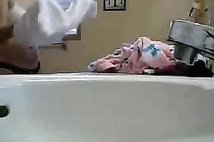 Homemade solo with my busty ex GF dressing up in the washroom