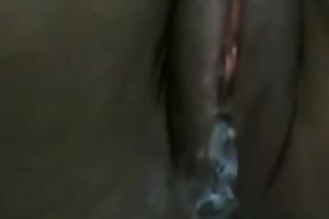 Hot dark hottie likes closeup view of her own cookie