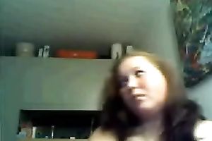 Chubby dilettante chick shows her large boobies for the cam