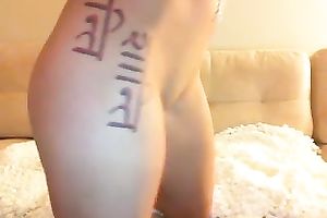 Gorgeous brunette hair with sparkling smile undresses and masturbates