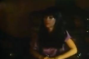 Retro dark brown groans sweetly whilst getting her cookie screwed