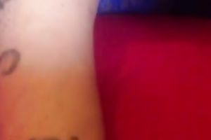 Tattooed skank with large love melons is rubbing her love tunnel with enthusiasm