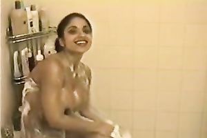 Young and wicked black haired sweetheart takes a shower