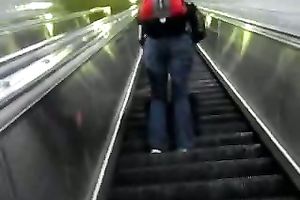 This hot babe receives on an escalator and has no idea I am spying on her
