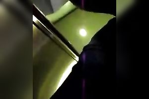 This hot babe receives on an escalator and has no idea I am spying on her