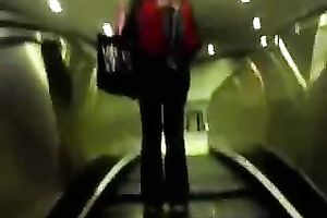 This hot babe receives on an escalator and has no idea I am spying on her