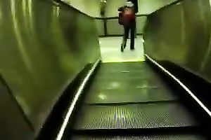 This hot babe receives on an escalator and has no idea I am spying on her