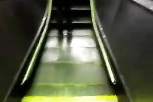 This hot babe receives on an escalator and has no idea I am spying on her