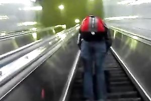 This hot babe receives on an escalator and has no idea I am spying on her