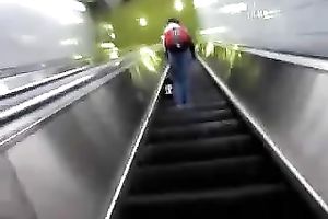 This hot babe receives on an escalator and has no idea I am spying on her