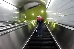 This hot babe receives on an escalator and has no idea I am spying on her