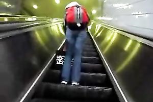 This hot babe receives on an escalator and has no idea I am spying on her