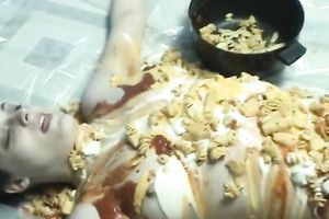 Food fetish homemade solo with a woman putting pasta on her body