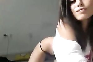 Desirable hottie with a pleasing bum is moving her body very seductively