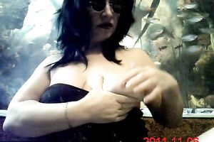 Those freaky sunglasses make her look like Marylin Manson