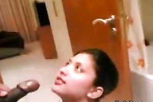 Beautiful Indian wife wearing stewardess uniform gives head in a hotel room