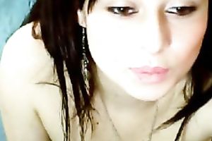 Hot brunette hair dilettante legal age teenager with hot makeup on web camera