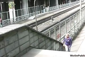 Irina pees her pants and changes her garments in a park