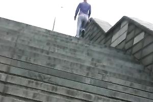 Irina pees her pants and changes her garments in a park