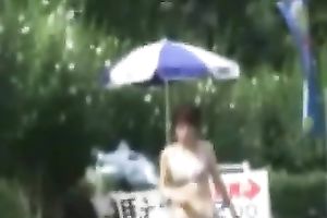Amateur Asian gals in bikinis receive caught on a hidden web camera