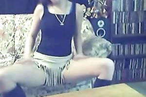 Webcam solo with a long-haired beauty playing with her pussy