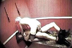 Hidden web camera scene with a harlot engulfing and riding a penis