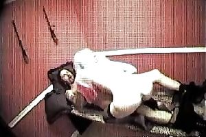 Hidden web camera scene with a harlot engulfing and riding a penis