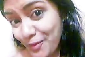 Flirty and lascivious Indian hoochie shows off her saggy milk shakes