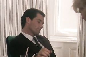 Hot blond secretary gives head to her stylish boss