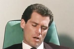 Hot blond secretary gives head to her stylish boss